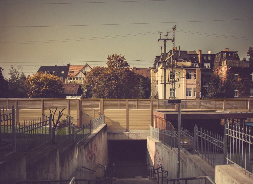 concrete bridge between houses