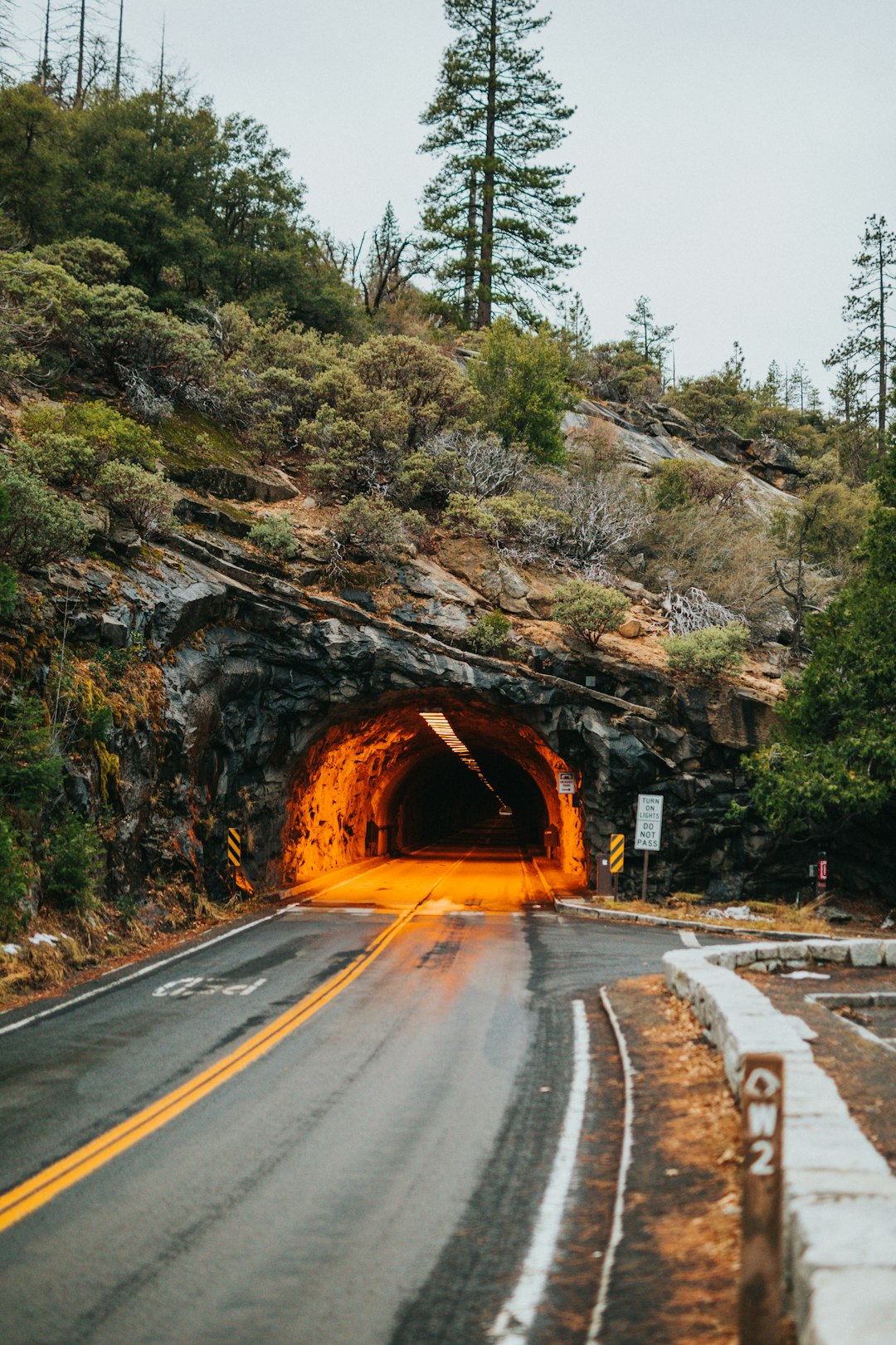 orange light coming from a tunnel road