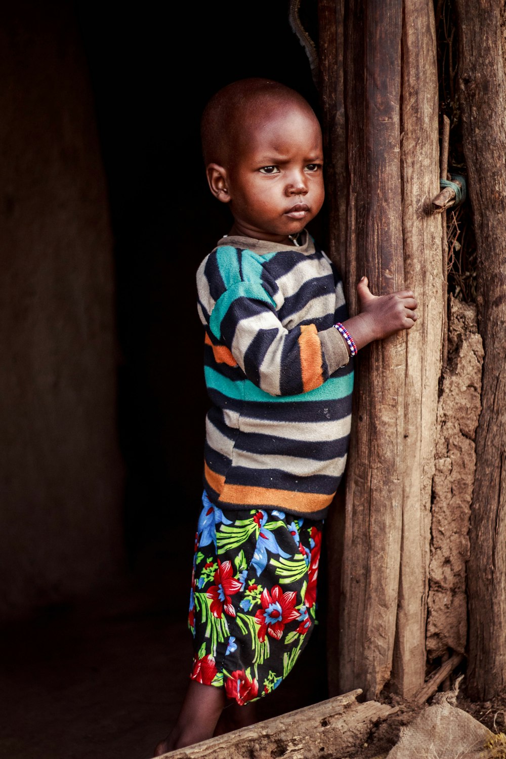 boy standing at the doorway