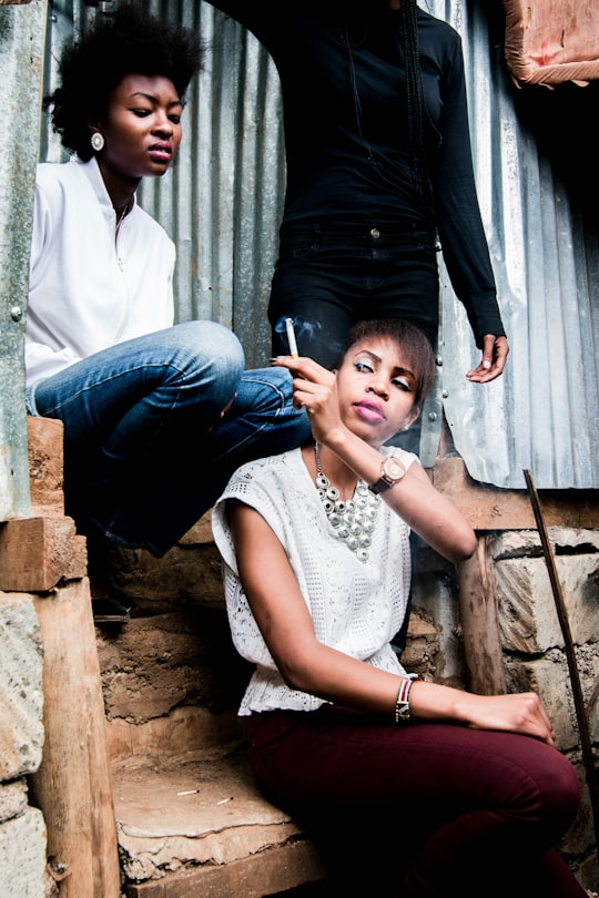 woman wearing white shirt in Kibera Kenya