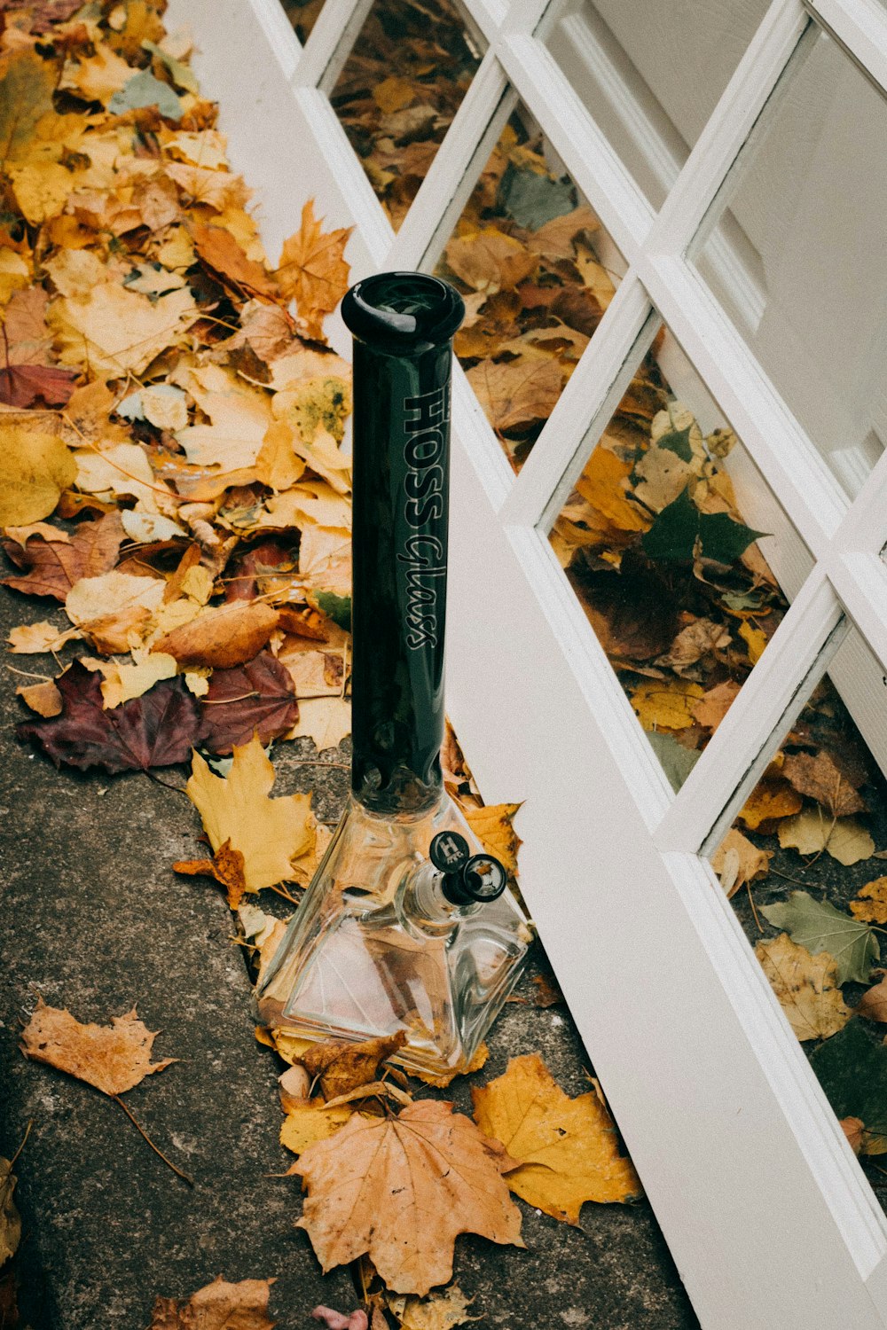 clear and black glass bottle