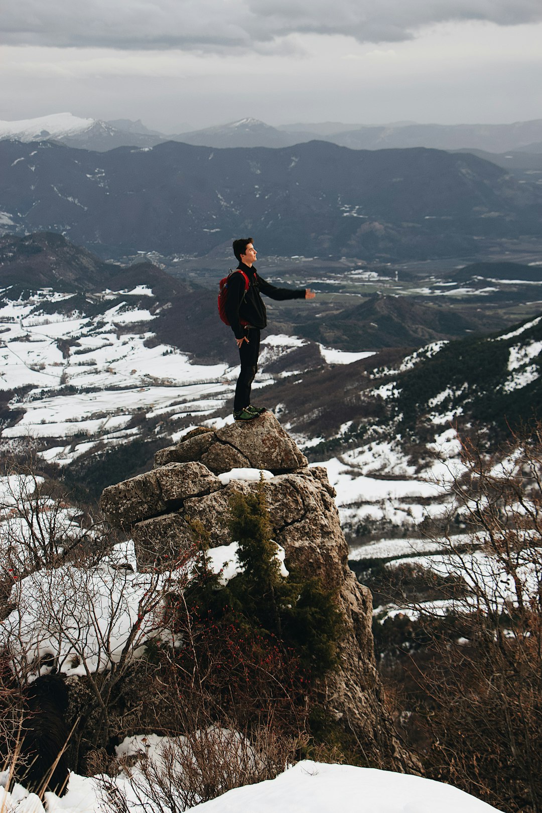 man standing on rock