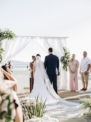 newly wed couple on isle getting married at shore