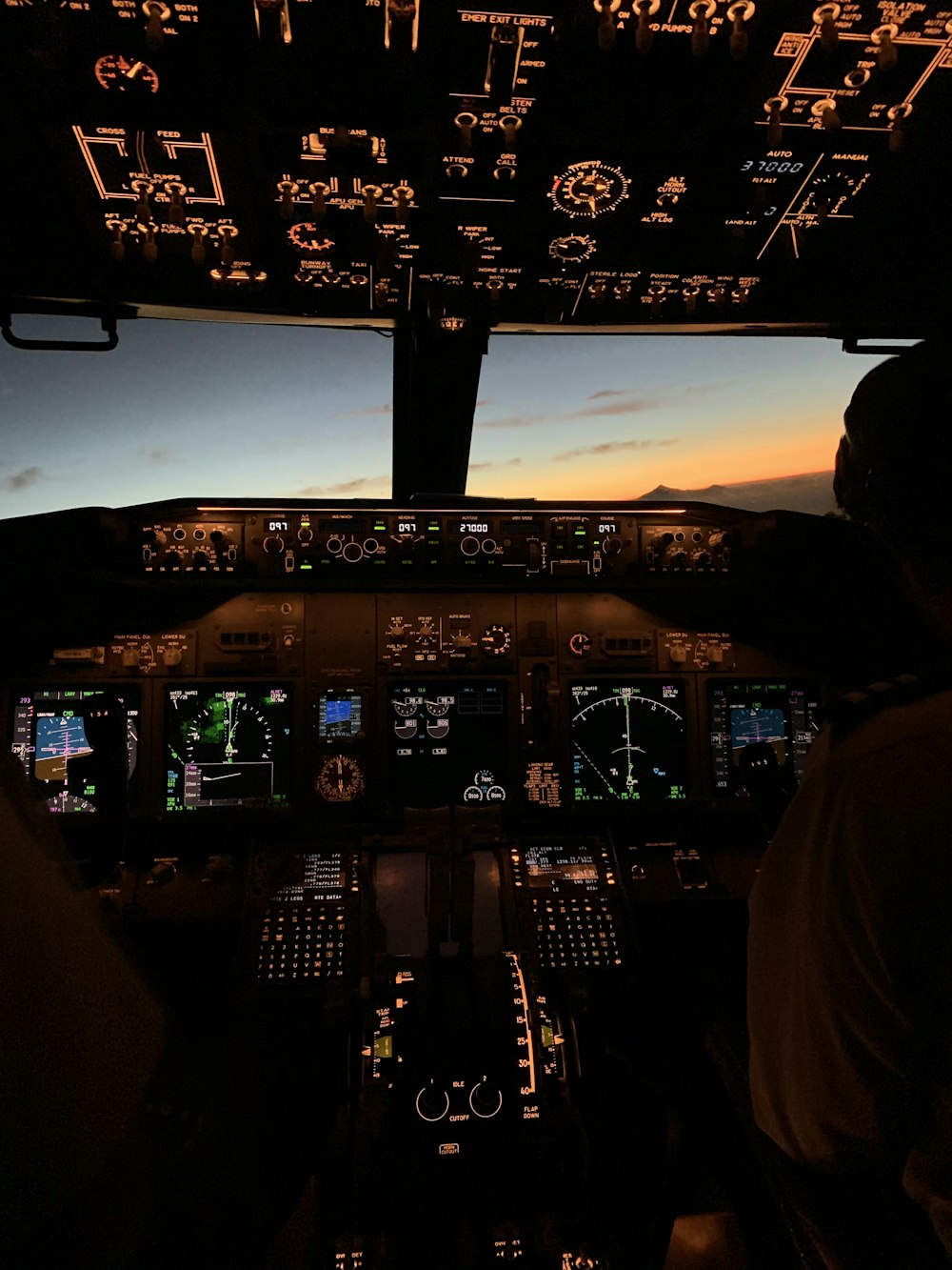 shallow focus photo of airplane cockpit