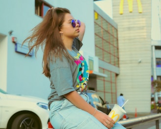 shallow focus photo of woman in gray T-shirt