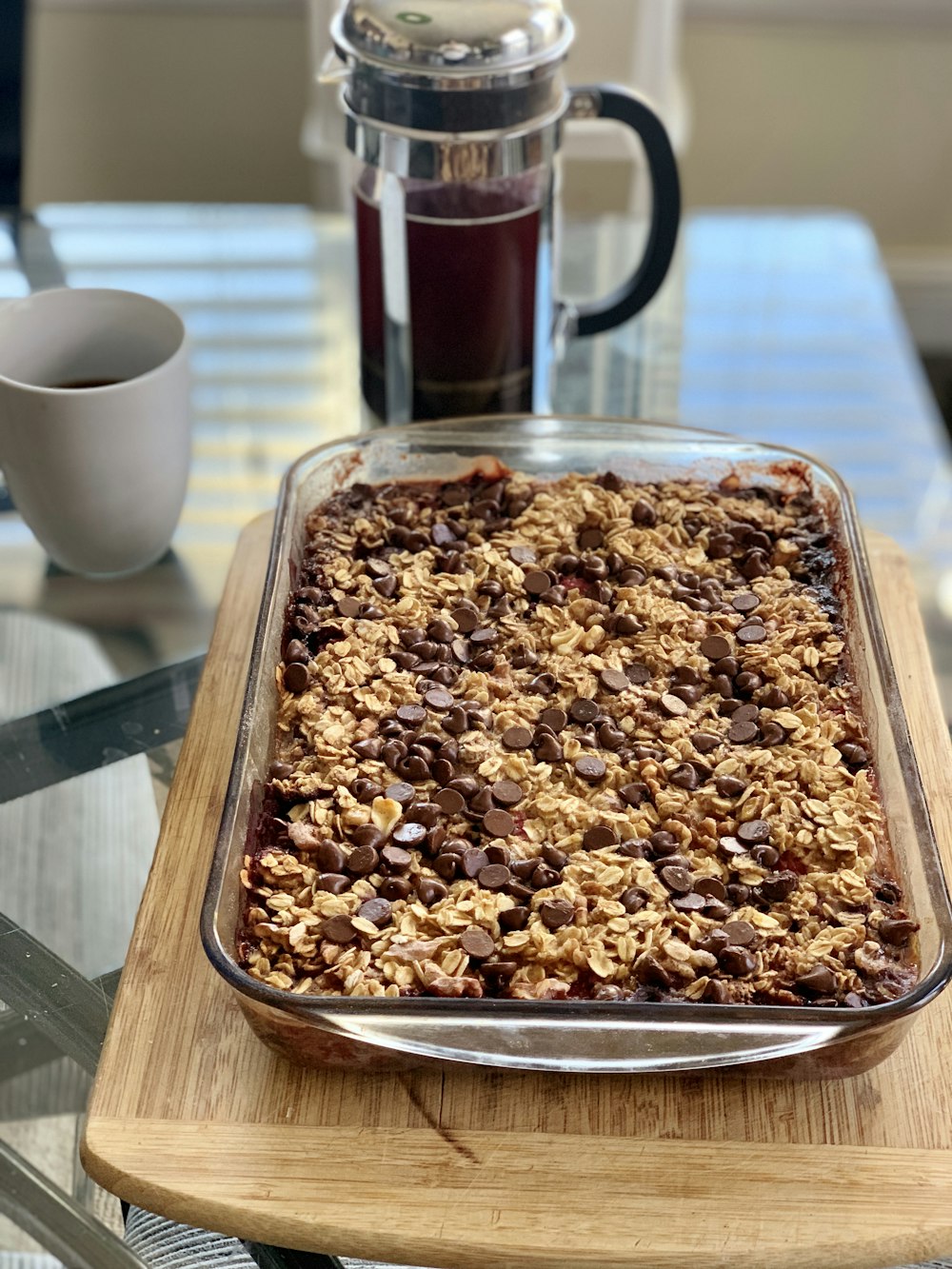 pastry in clear baking dish on wooden base