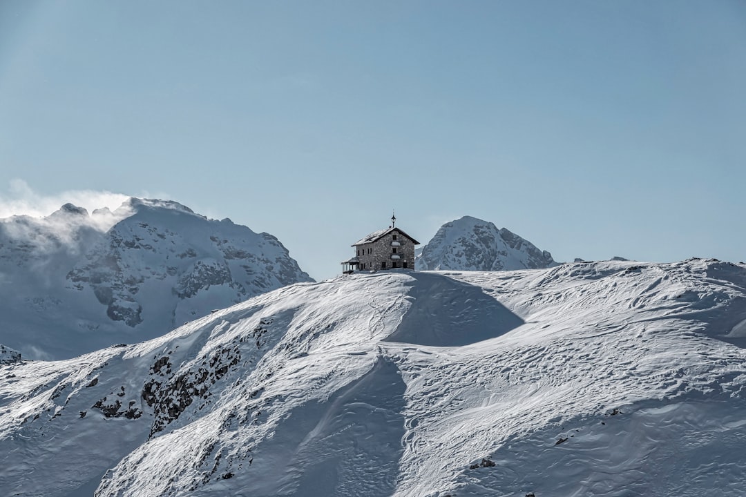 building on snow-capped mountain
