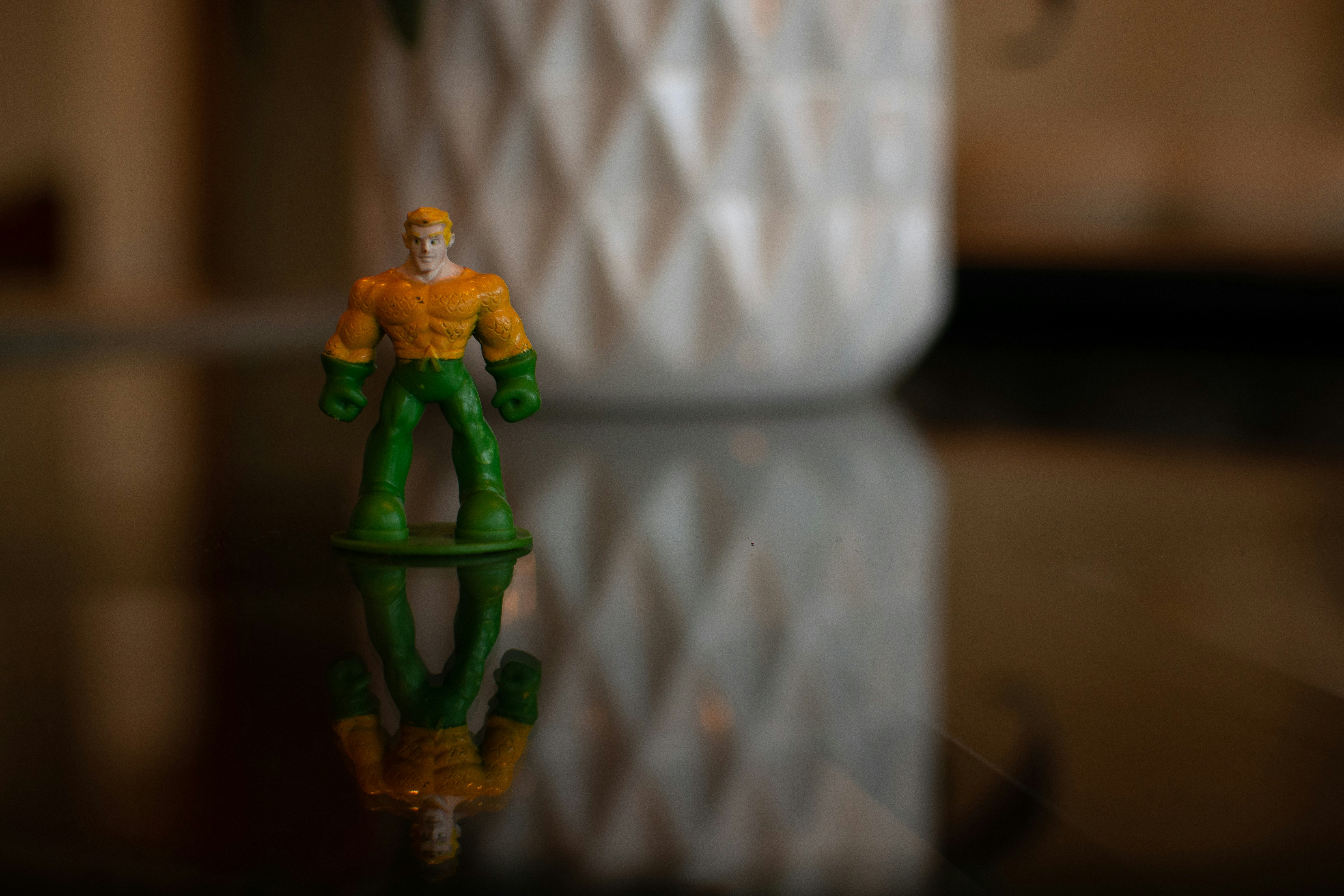 yellow and green plastic toy