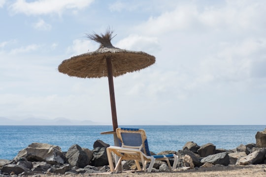white and brown beach chair in Lanzarote Spain