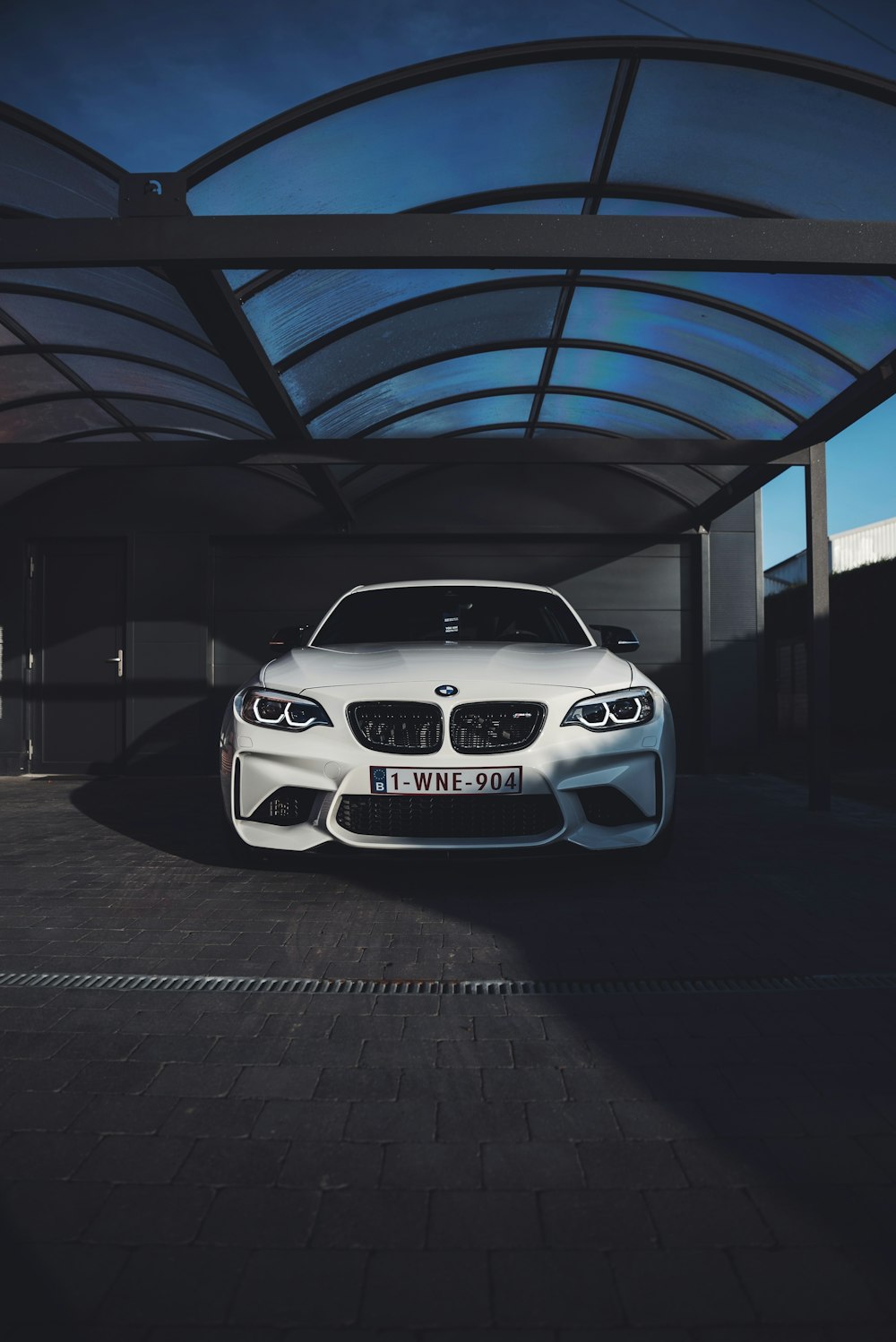 white BMW vehicle photograph