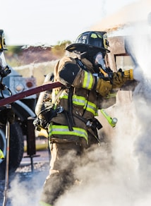 three fireman preventing fire during daytime