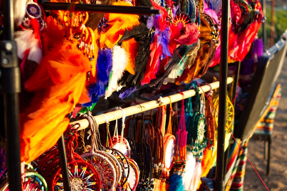 colorful dream catchers hanging on a rack
