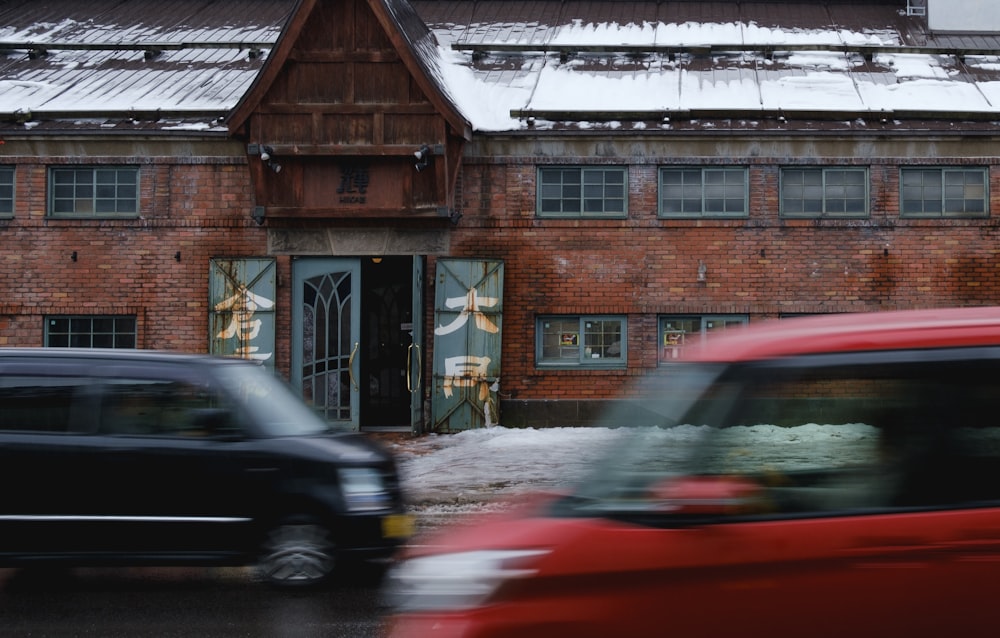 time-lapse photography of vehicles passing the street