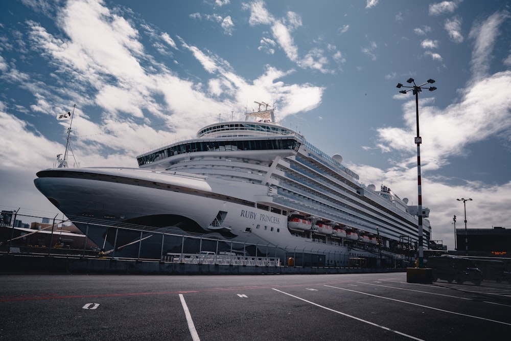 white cruise ship at port