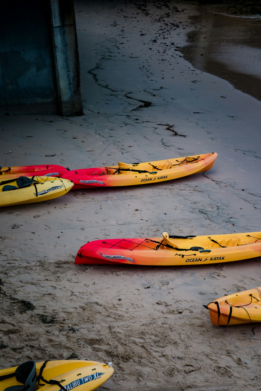 selective focus photography of kayak on seashore