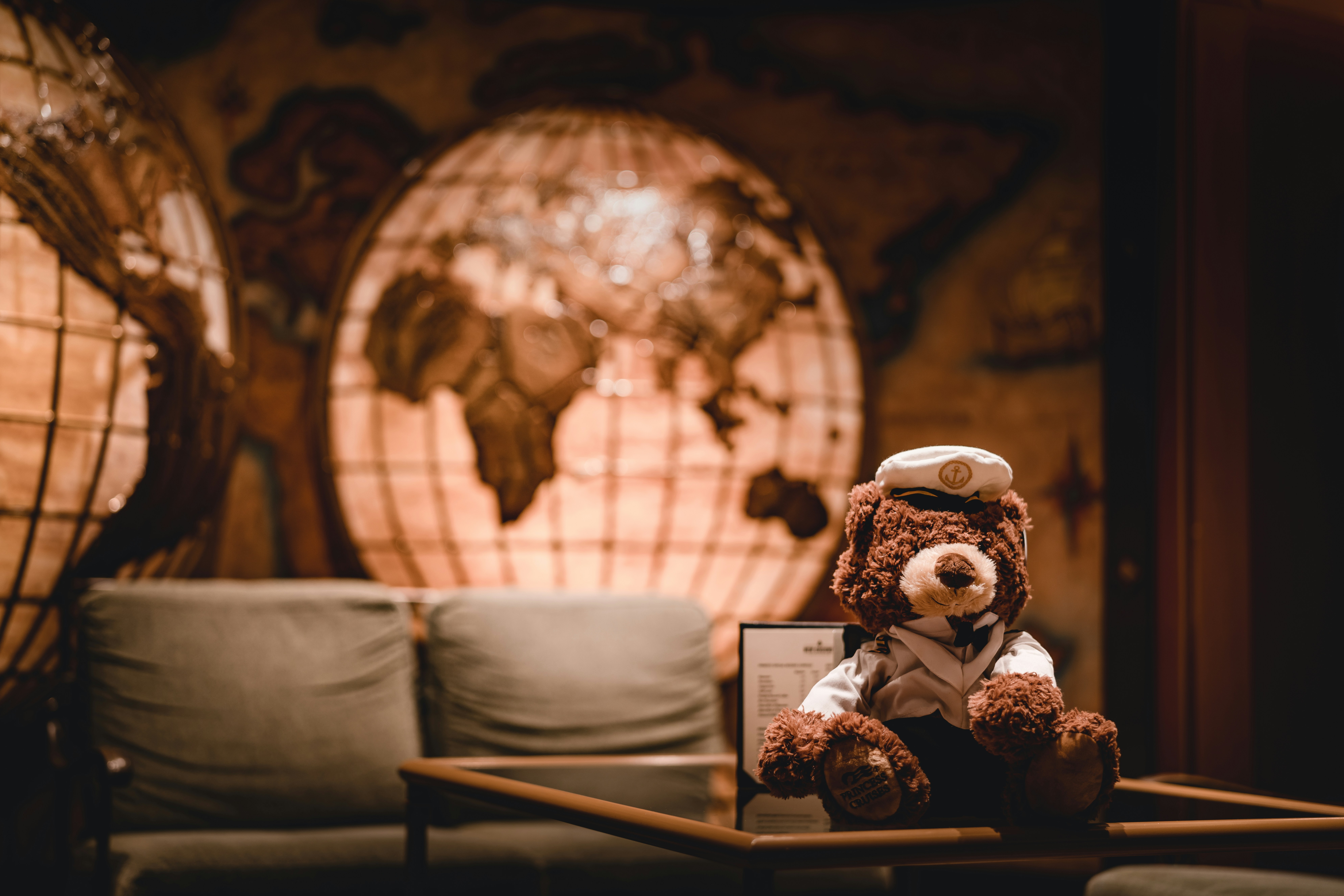 brown bear plush toy on top of a table