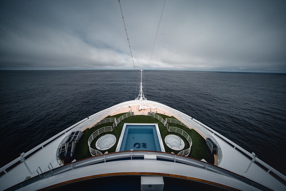 boat at the ocean during day