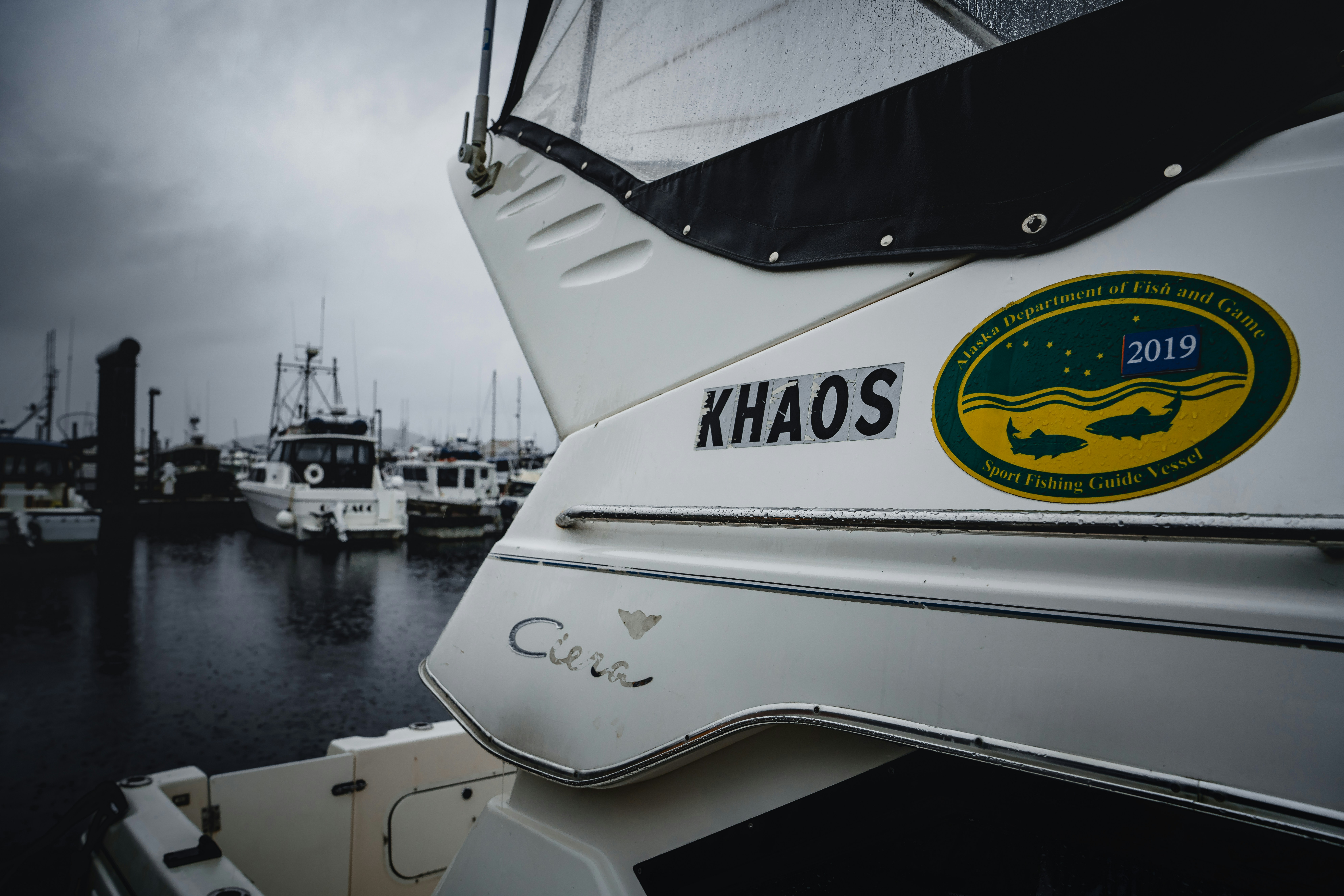 Khaos boat at dock with premium lettering