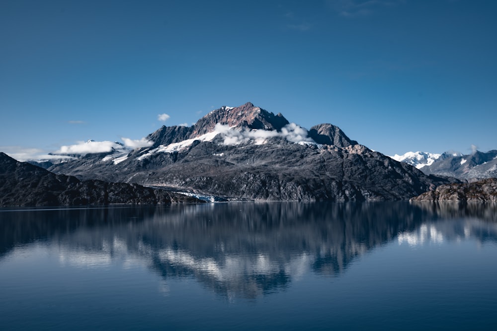 a mountain with a lake in front of it