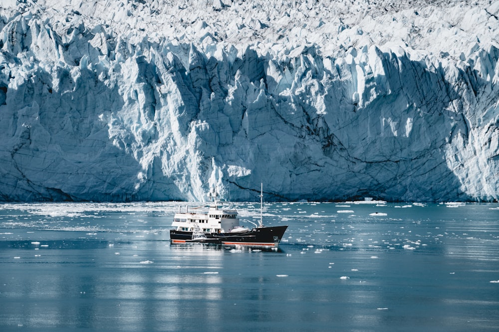 white and black boat photograph