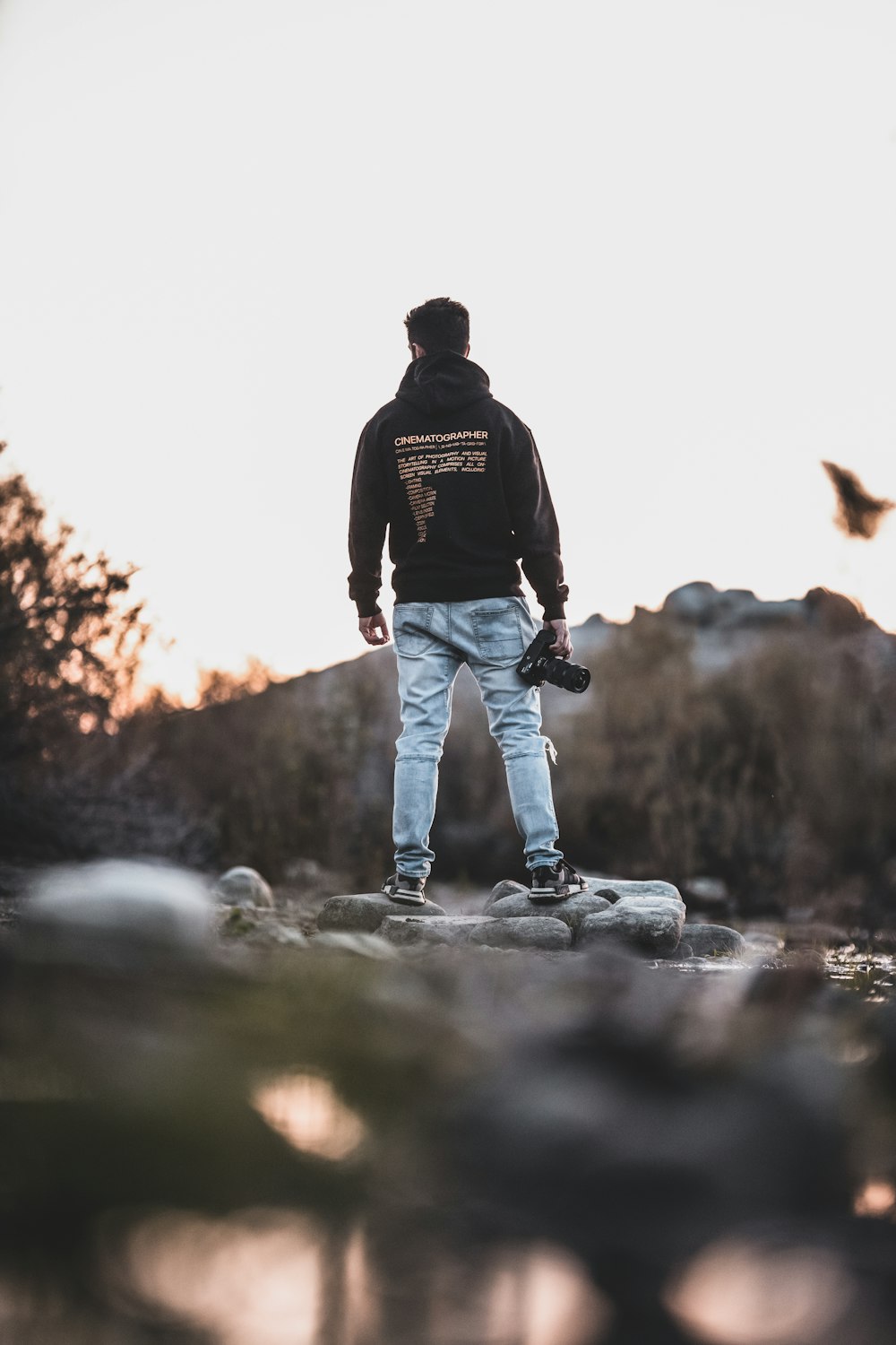 man standing on rocks