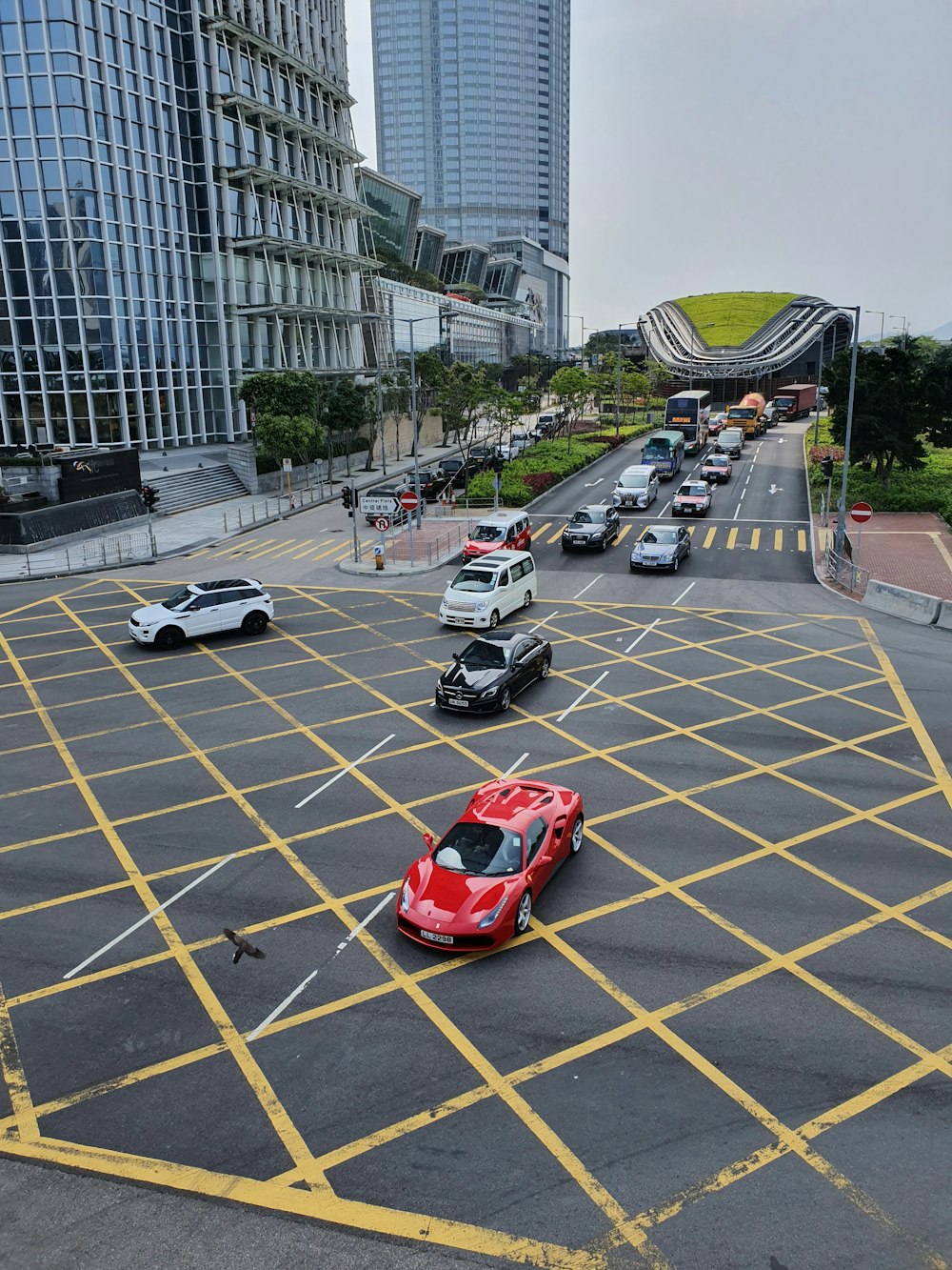 vehicles passing on road during daytime