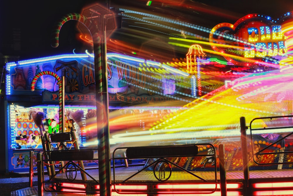 a carnival ride at night with a lot of lights