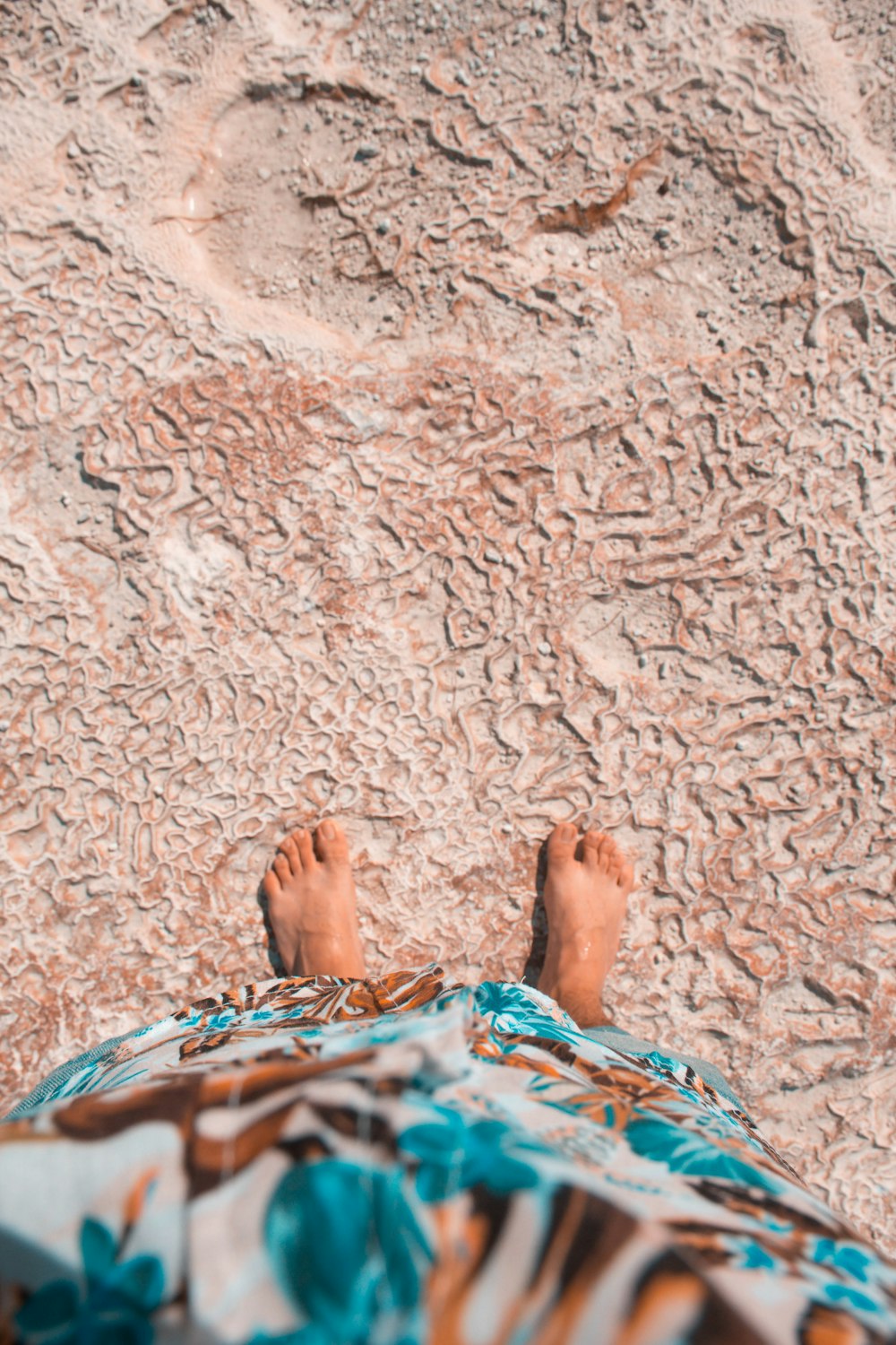 person standing on sand