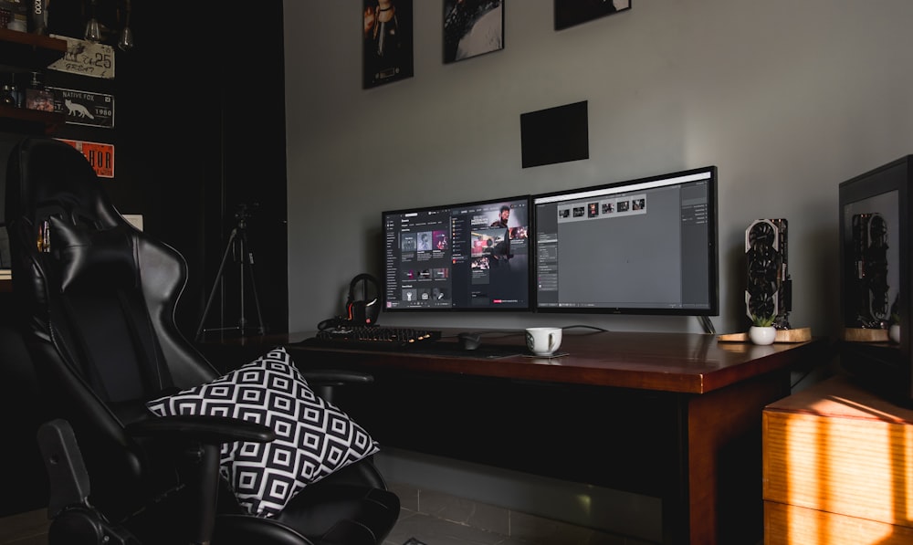 two turned-on computer monitors