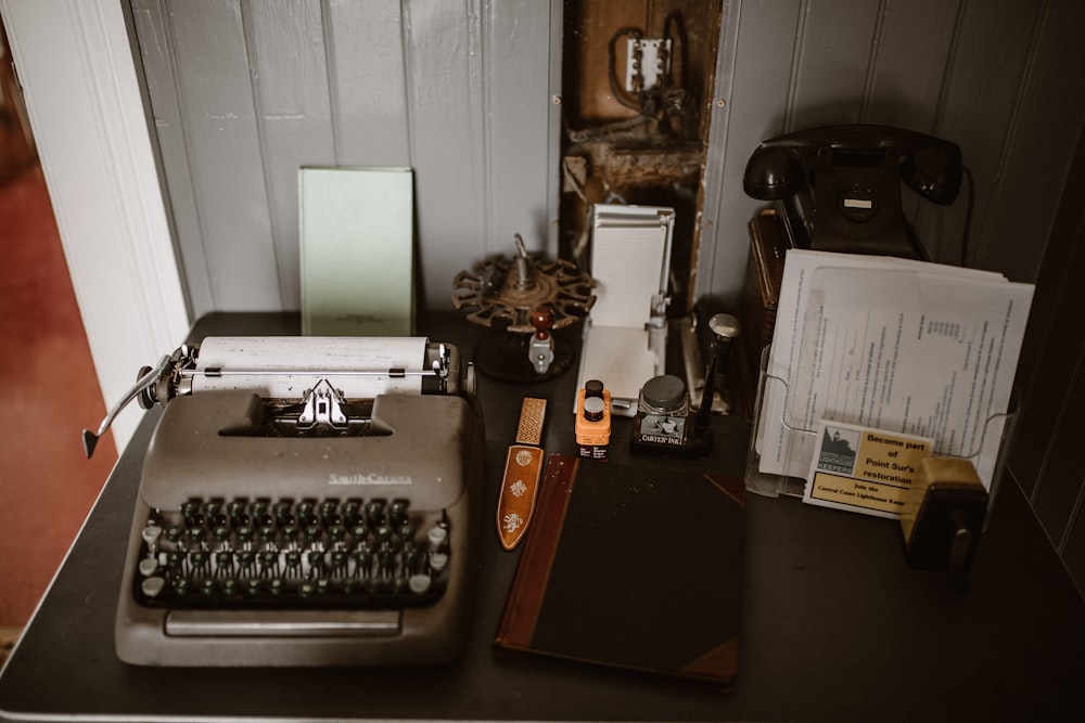 grey typewriter on desk