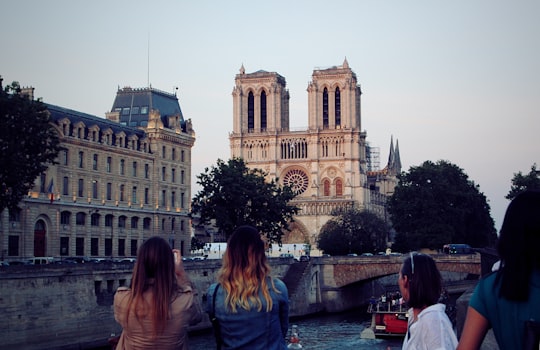 people near canal in Cathédrale Notre-Dame de Paris France