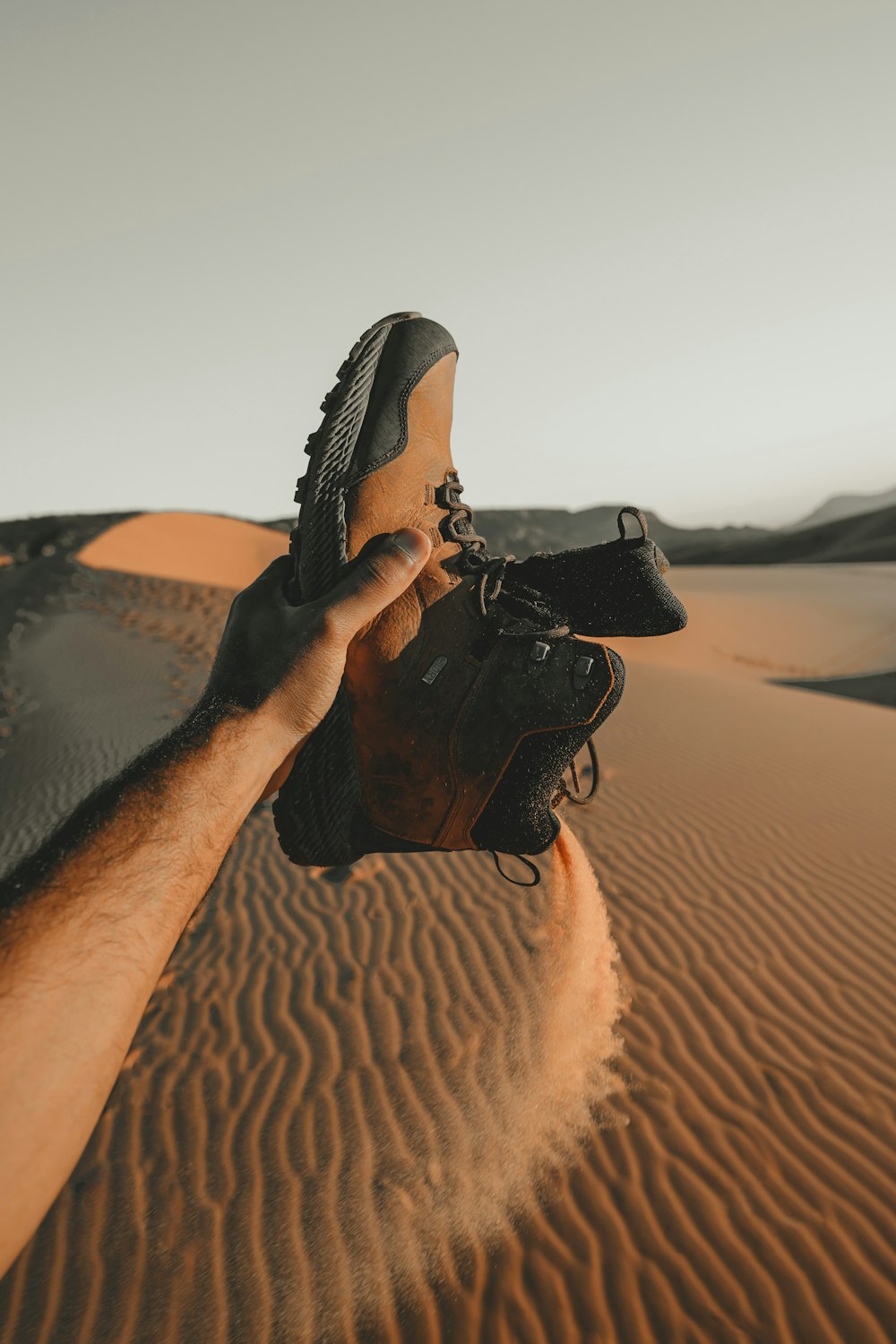 brown boot with sand