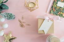 Close-up of premium custom gifts arranged neatly on a modern desk with soft gold accents.