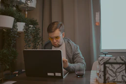 man working on laptop