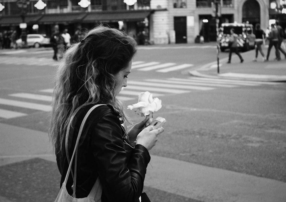 woman holding flower