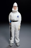 person wearing white overalls