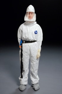 person wearing white overalls