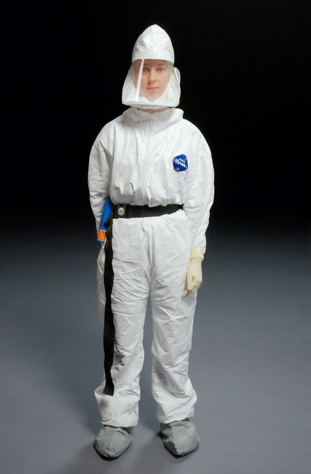 person wearing white overalls