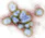 a group of blue and green cells on a white surface