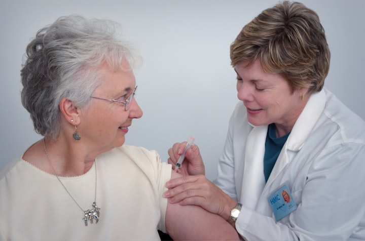 Caregiver supporting an older adult at home