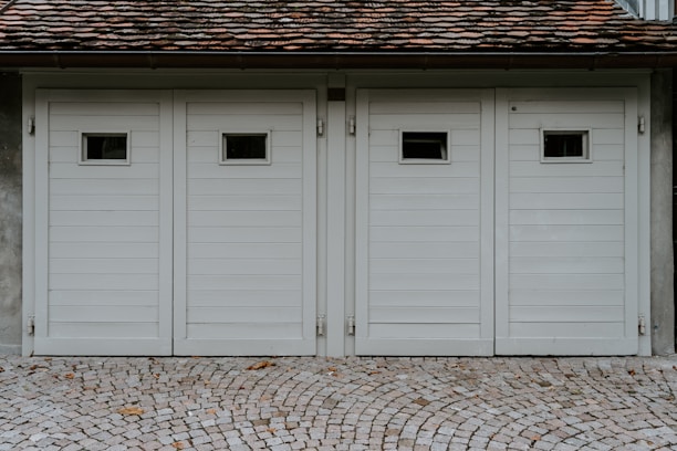 closed white wooden house garage door