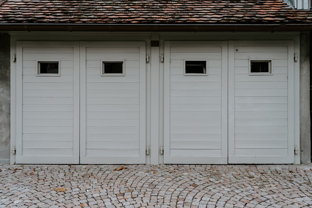 closed white wooden house garage door