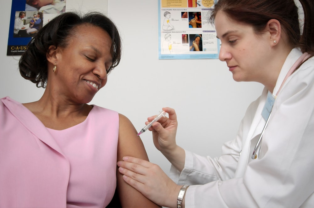 woman getting vaccine