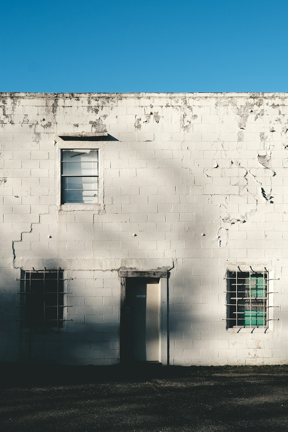 facade of white 2-storey building