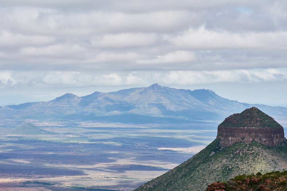 mountain under white clouds