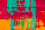 An abstract painting with bold colors.