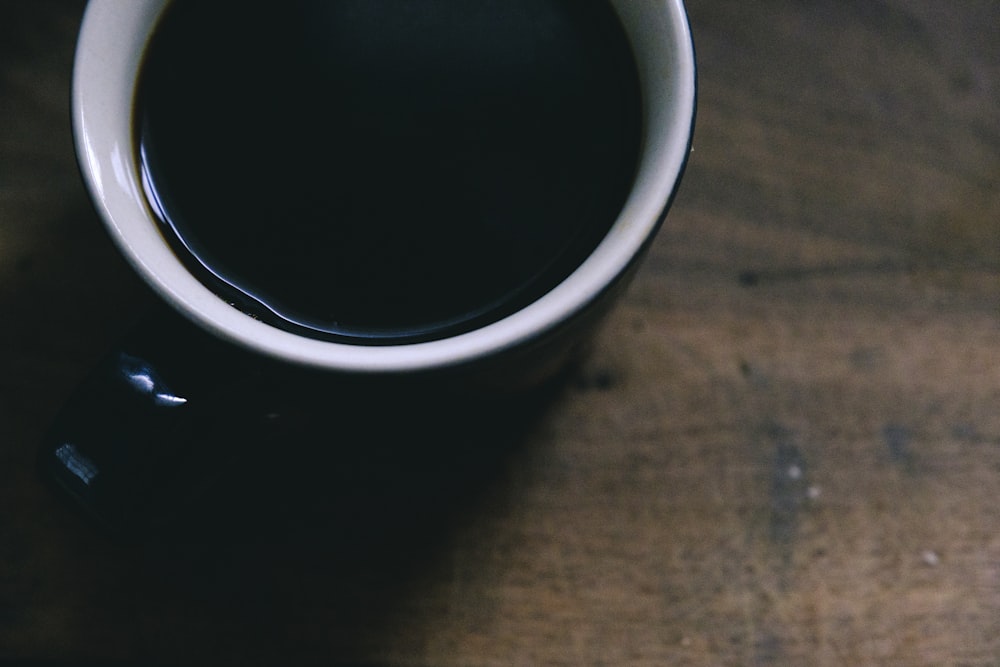 white and blue mug