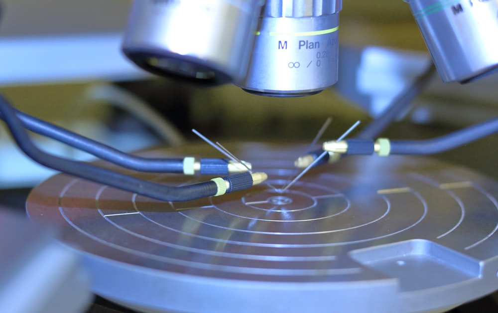 a close up of a machine with some wires on it