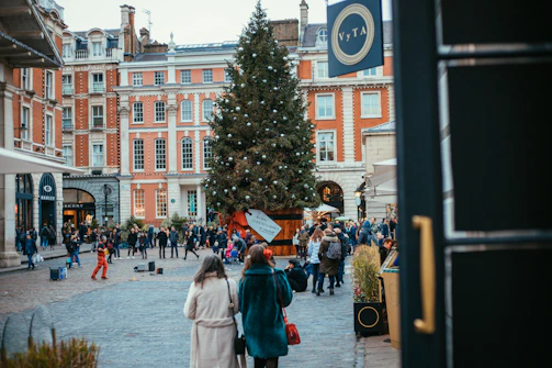A vibrant community gathering in a traditional square of Santa Catarina, with colorful decorations and local crafts.