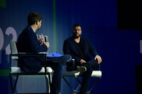 two men talking to each other